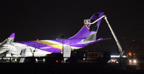 Covering the Thai Airways logo with a black paint. Image from @RichardBarrow