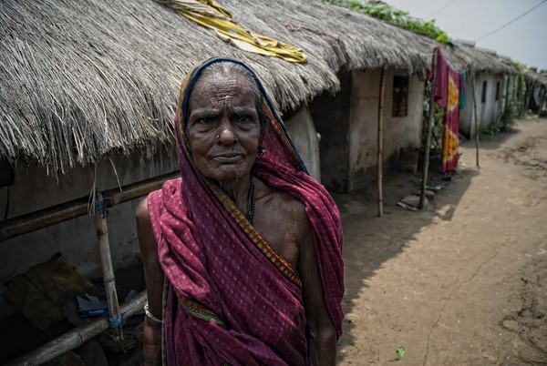 An old woman inside the transit camp of POSCO-India. They have suffered for the last four years in overcrowded, unhygienic living conditions with only Rs.20 (50 cents) per person per day to live on. Image by AYush Ranka. Copyright Demotix (22/6/2011)