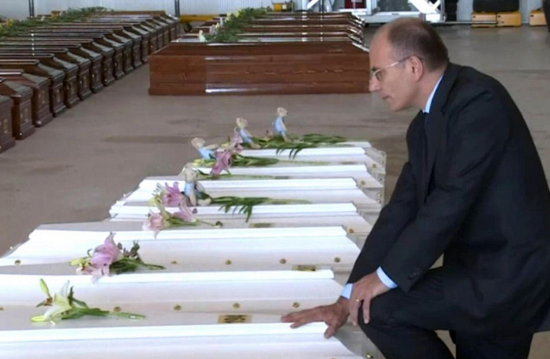 Italian Prime Minister, Enrico Letta, visits the site of the coffins before the funeral. Photo Palazzo Chigi used under CC License BY-NC-SA 2.0.