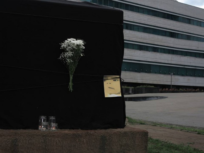 The day after baby Belmina's death, activists placed a black sheeth with Belmina's picture over a new monument in front of the Parliament building in Sarajevo; image courtesy of #JMBG za sve ("#JMBG for All"), used with permission. 
