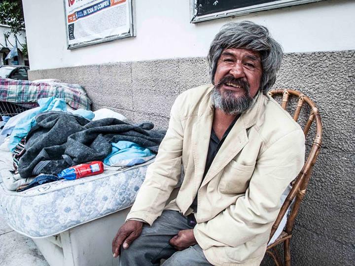 "He lives on the street with a friend. They have 2 mattresses, a couch and 3 chairs (one for guests). He invited me to sit down besides him, after some minutes chatting." Photo by, Shared on Facebook and used with permission.