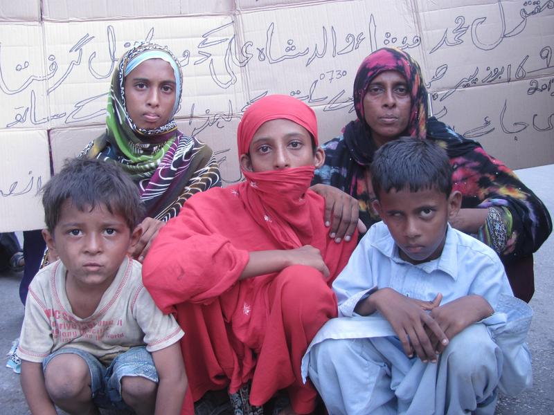 Sheeren is a widow woman protesting with her orphan children at the Karachi Press Club against the murder of her husband. The victim's family demanded that police arrest the killers and gives us peace and justice. Image by Ayub Mohammad. Copyright Demotix (29.9.2013)