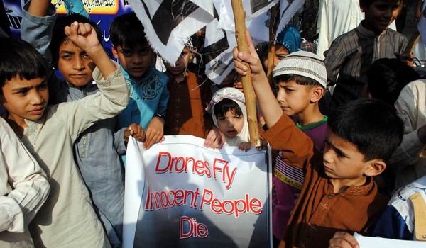 Supporters of Jamat-ud-Dawa chant slogans during a protest demonstration against the U.S. drone attacks outside the Hyderabad Press Club. Hyderabad, Pakistan. Image by Rajput Yasir. Copyright Demotix (1/11/2013)