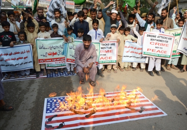 Activities of Jammat Ul Dawa hold a protest against the Drone attacks in Pakistan and killing of innocent peoples by the drone attacks. They also burned the US flags during the protest out side the Hyderabad press club. Image by janali laghari. Copyright Demotix (8/11/2013)