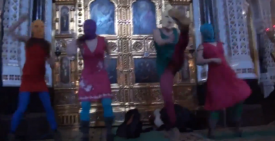 A scene from Pussy Riot's infamous "punk prayer" in February 2012, YouTube screenshot.