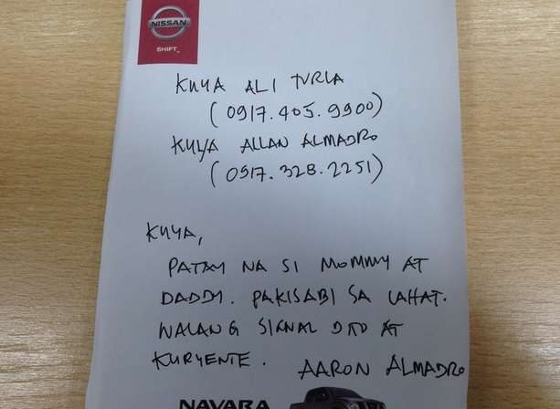 The note reads: Brother, mommy and daddy are dead. Please inform everyone. No signal here and electricity. Aaron Almadro. Image from GMA News