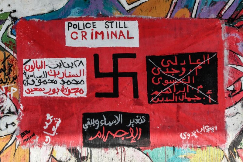 The Police are Criminal, reads this graffiti from Cairo. Photograph shared by @OmarKamel on Twitter