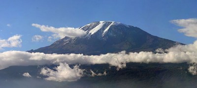 Mount Kilimanjaro,  the highest mountain in Africa, and the highest free-standing mountain in the world, in Moshi, Tanzania. Photo released by Muhammad Mahdi Karim (www.micro2macro.net) under GNU Free Documentation License.