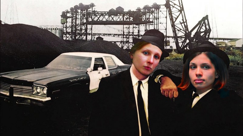 Pussy Riot's Maria Alekhina and Nadezhda Tolokonnikova, depicted as the undeterred-by-prison music duo The Blues Brothers. Images mixed by Kevin Rothrock.