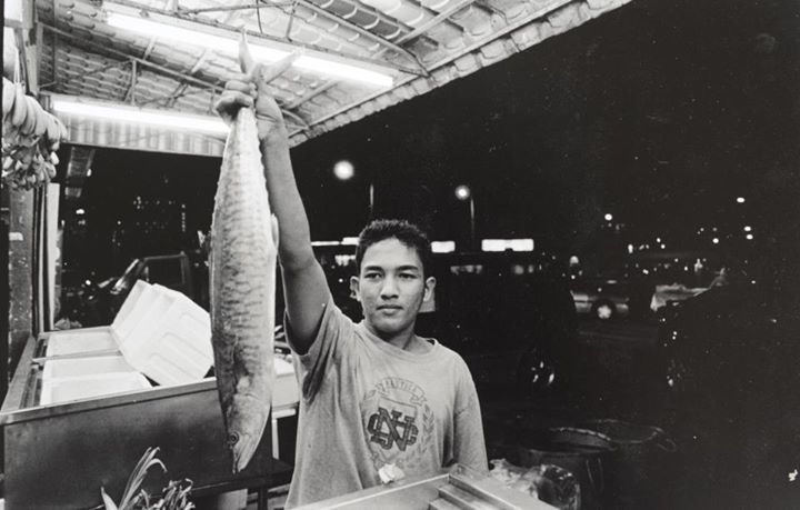 "Abang (brotherly term for a guy) Hafiz washes and arranges the fish and vegetables at one of the agricultural grocery stores in KL. It is late at night and people are still coming in." Photo from Facebook page Humans of Kuala Lumpur