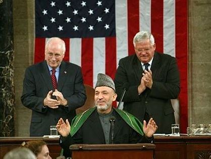 Hamid Karzai addressing the joint meeting of US Congress on June 15, 2004. Image by the White House, part of public domain.