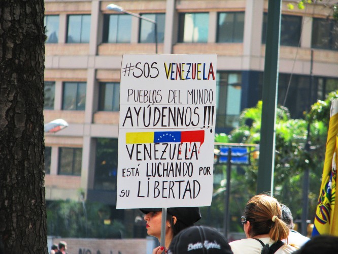#SOSVenezuela. Photo by Kira Kariakin.