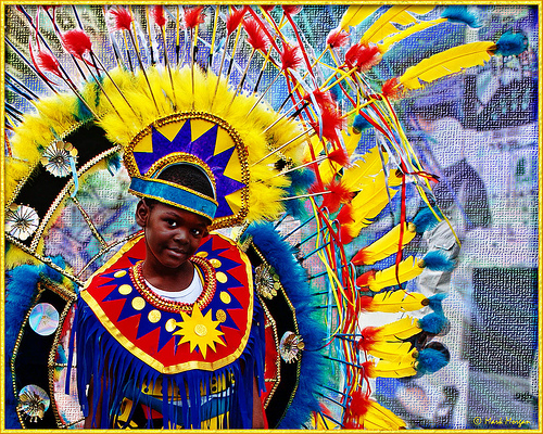 Youngster in traditional "Indian Mas" costume.  Image by Mark Morgan, used under a CC license. 