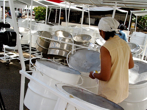 Pans being cleaned in preparation for a performance.  Image by caribbeanfreephoto, used under a CC license. 