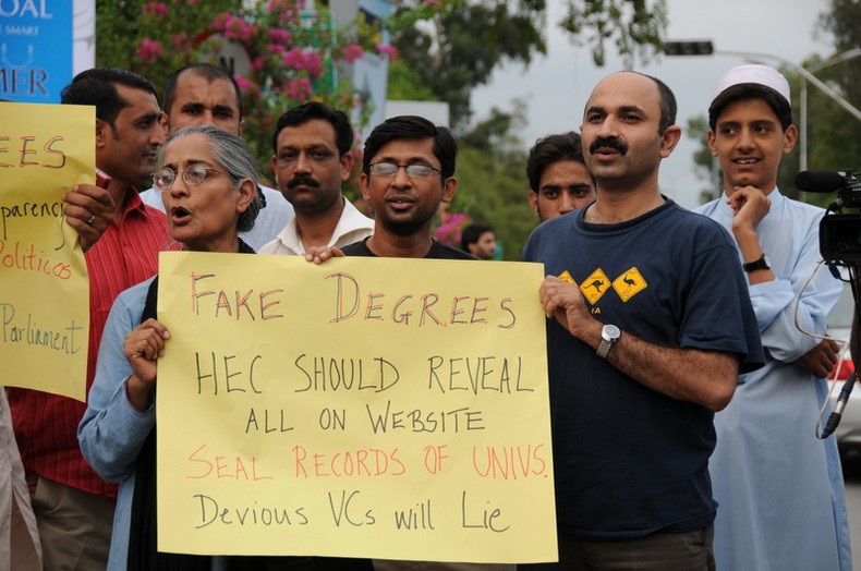 Pakistan Civil society activists protest against  fake degrees.  Image by Isa Daudpota. Copyright Demotix (20/07/2010)