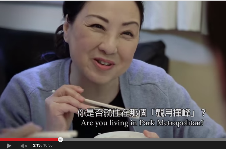 Angelina Lo, playing the mother in the video, is keen to know where exactly her daughter's boyfriend lives. Screen capture from YouTube. 