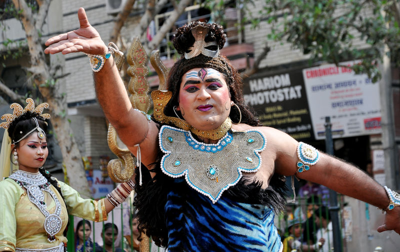 A man dressed as Hindu God Lord Shiva performs during Maha Shivratri Celebration in New Delhi. Image by Rohit Gautam. Copyright Demotix (10/3/2013)