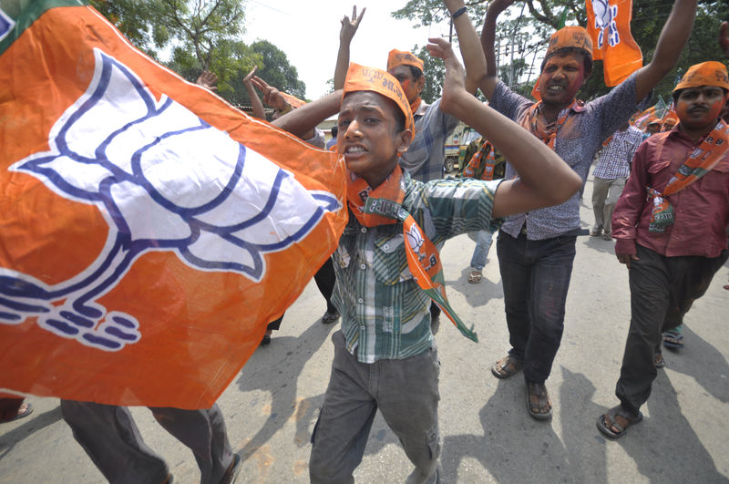 Bharatiya Janata Party (BJP) supporters were dancing in the streets to celebrate the win of the BJP. Image by Abhisek Saha. Copyright Demotix (21/05/2014)