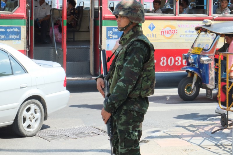 A Thai soldier stands guard on Ratchadamnoern Avenue in central Bangkok. Photo by Matthew Richards, Copyright @Demotix (5/22/2014)
