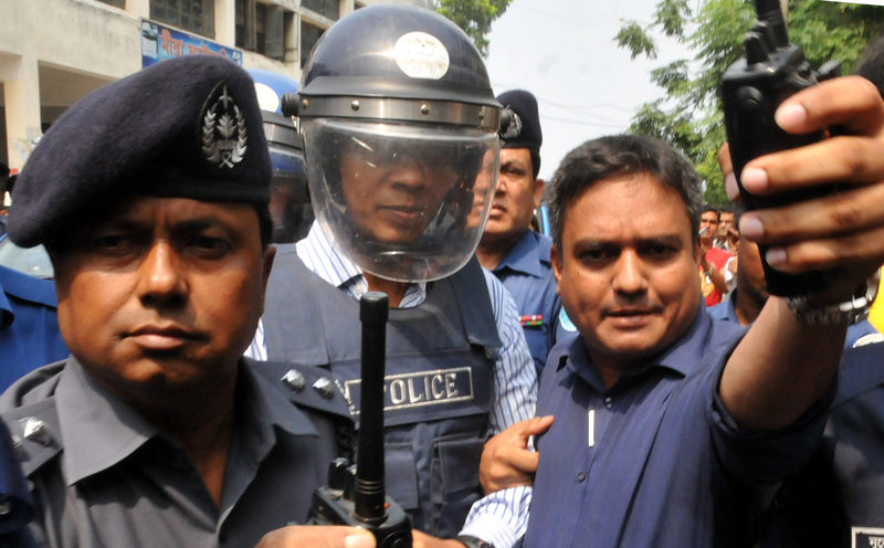 Law enforcers take former Rab official Lt. Col. Tareque Sayeed the Senior Judicial Magistrate court in Narayanganj. Image by Indrajit Ghosh. Copyright Demotix (17/5/2014)