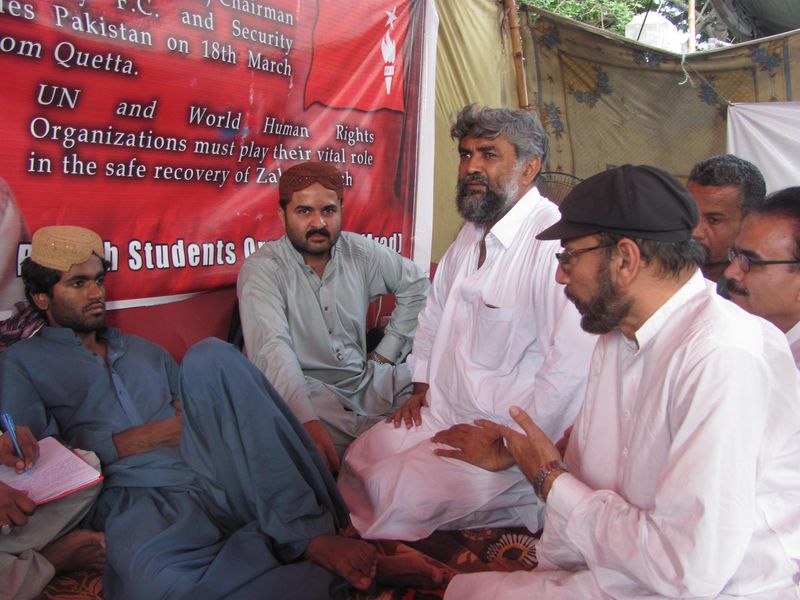 Members of civil society visits the hunger strike camp of Lateef Johar protesting for the missing student leader Zahid Baluch from Quetta. Image by Ayub Mohammad. Copyright Demotix (31/5/2014)
