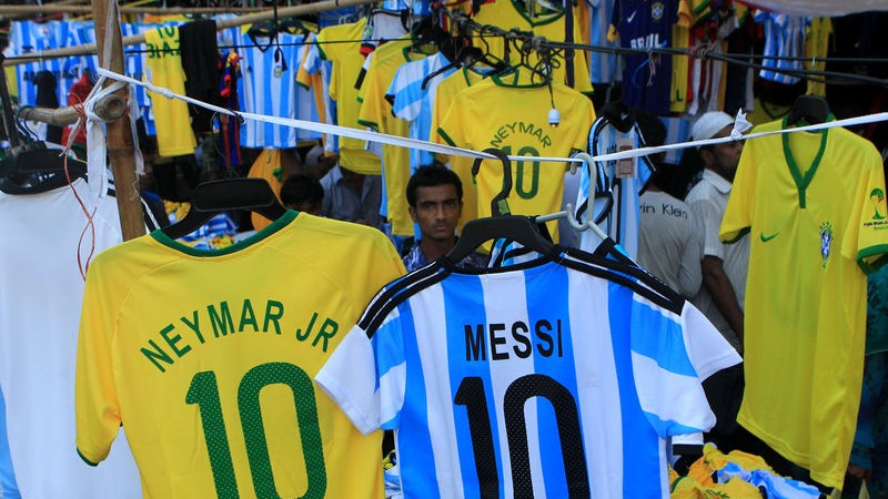 Traders are out to make some quick money as the sale of jerseys of various countries soar ahead of the FIFA World Cup in Brazil. Image by Md. Manik. Copyright Demotix (5/6/2014)