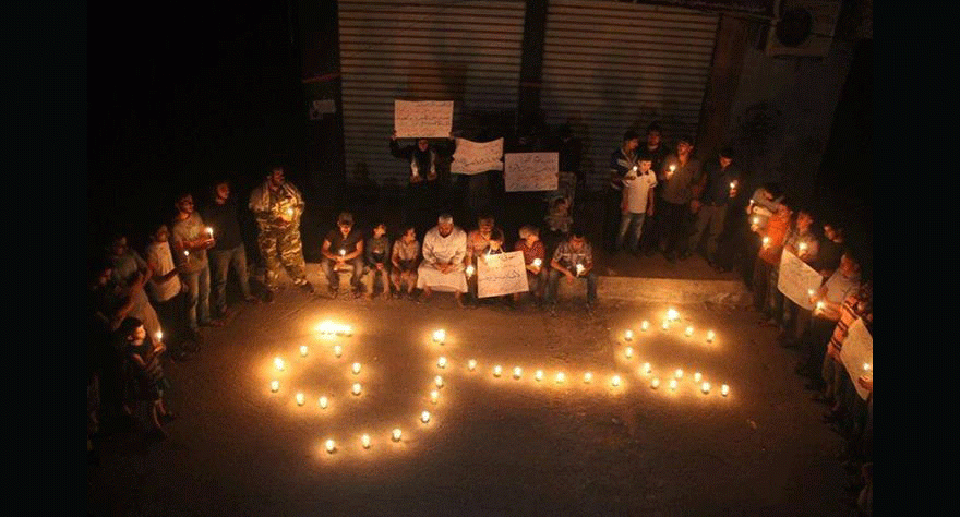 A vigil with candles in solidarity with Gaza in Aleppo, Syria. Source: Syria Stands with Palestine's facebook page 