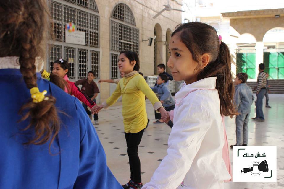 Girls play during one of the Kesh Malek projects in Aleppo, Syria. Source: Kesh Malek's website