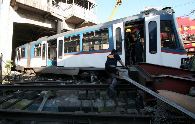 A train overshot it's stop at a terminal in Manila. Photo by Juan Carlo de Vela. Copyright @Demotix. (8/13/2014)