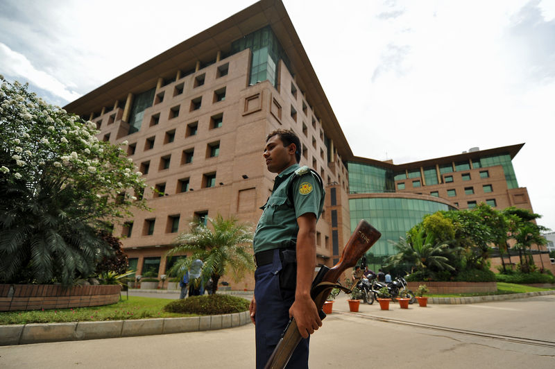 A police guards in front of the United Hospital in Dhaka. Image by Firoz Ahmed. Copyright Demotix  