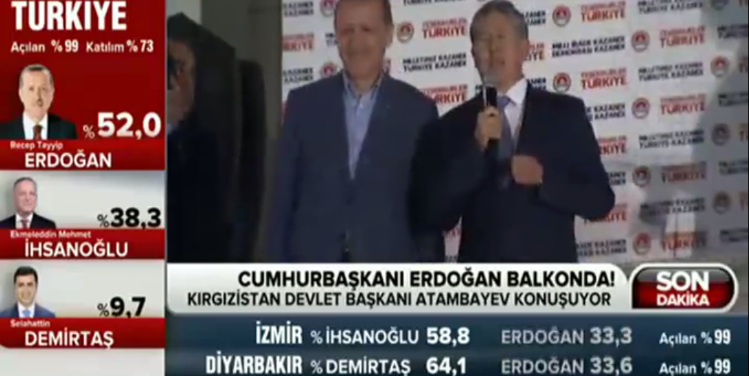 Atambayev celebrates his Turkish counterpart's victory. Screenshot from YouTube video uploaded by Zorbey Medya.
