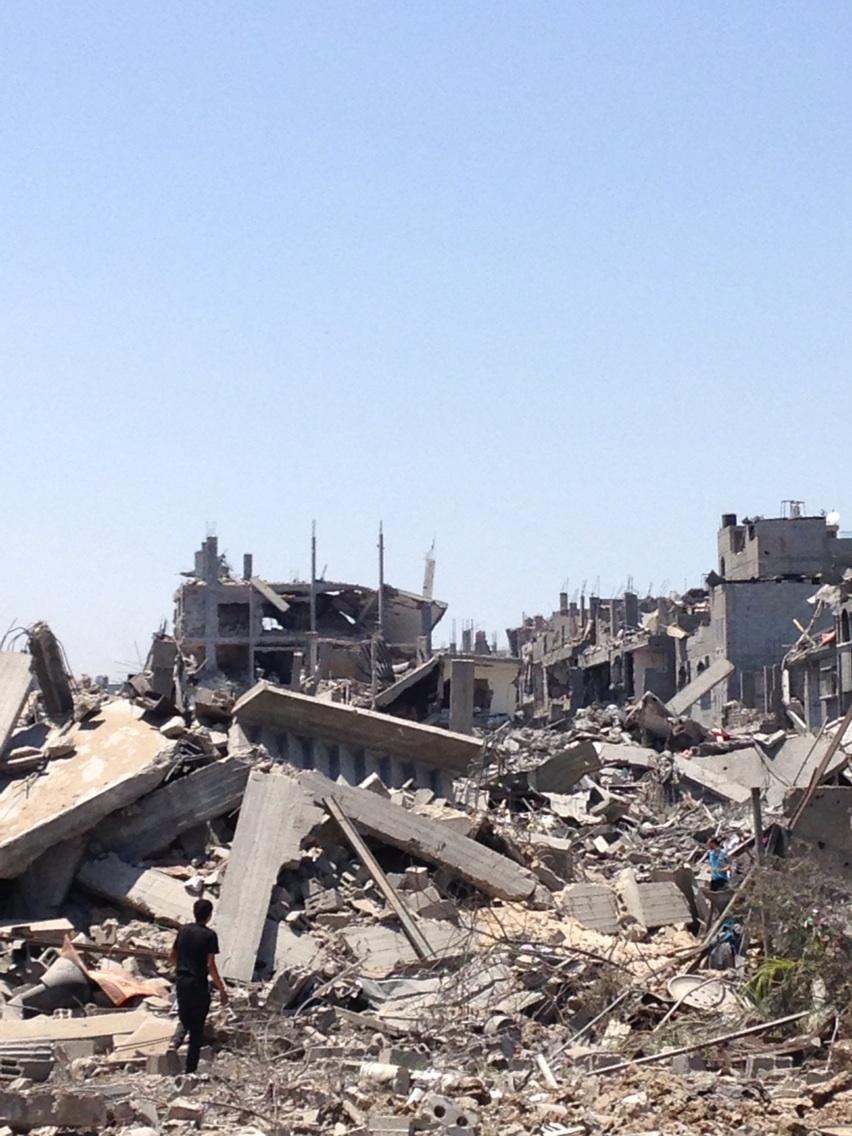 Washington Post's @BoothWilliam tweets, “Whole blocks of apartment houses destroyed in Shijaiyah. Scale is far far greater than previous Gaza wars.”