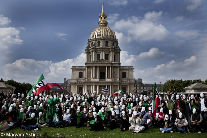 Iranians gather in Paris on June 12, 2010 to mark the first anniversary of the Green Movement, on the day the government was accused of rigging the 2009 Presidential elections.