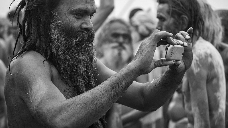 A sadhu in India goes hi-tech with a mobile camera. Image by utilitarian via Flickr. CC BY-NC