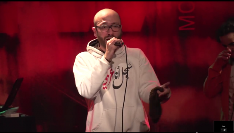 Lebanese rapper El Rass captured in a screenshot while performing at the TeMA Rebelle Festival  in February 2014, uploaded by YouTube user  campurr15