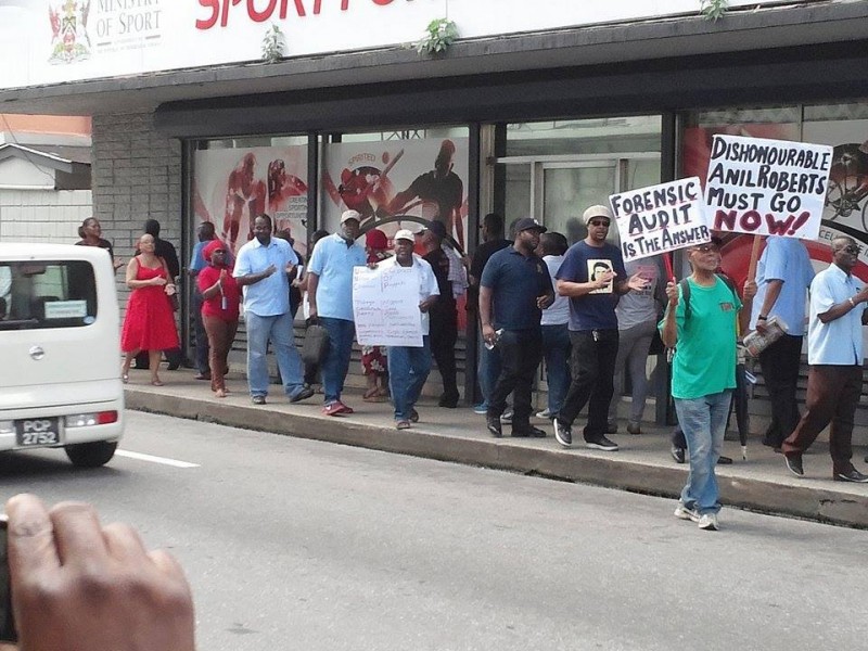 Protest in front of Trinidad and Tobago's Ministry of Sport earlier this week, agitating for the dismissal of former minister, Anil Roberts. Photo by Speak Out T&T, used with permission. 