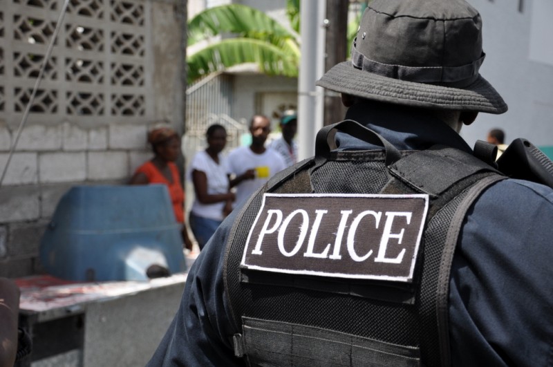 Police in Tivoli Gardens, Jamaica, during the 2010 State of Emergency; photo taken from the BBC World Service flickr page, used under a CC BY-NC 2.0 license. 