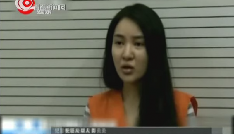 Guo Meimei confessed on CCTV on her crime and decadent lifestyle. She also apologized to Red Cross China for undermining its credibility. Screen capture from Shanghai TV on Youtube.