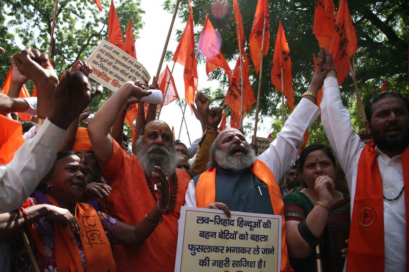 Activists of United Hindu Front raising slogan during a protest against Love jihad in New Delhi, India. Image by Anil Kumar Shakya. Copyright Demotix (23/9/2014)