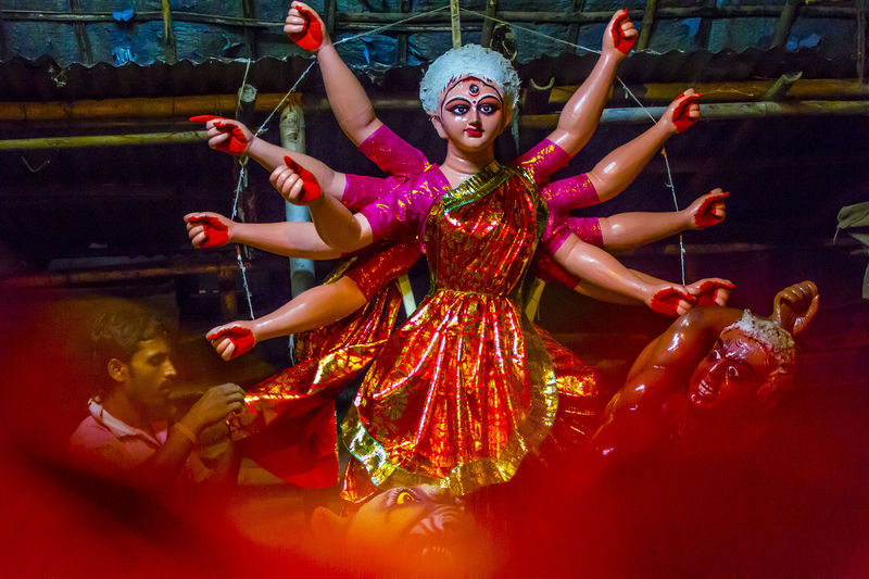 Durga Puja, the annual Hindu festival that involves worship of the Goddess Durga, who symbolizes power and the triumph of good over evil in Hindu mythology. Image by Luit Chaliha. Copyright Demotix (27/9/2014)