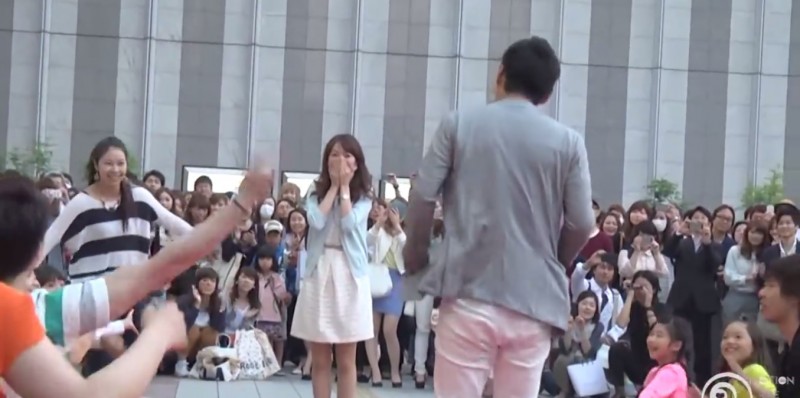 Screenshot of a viral flash mob marriage proposal in Japan.