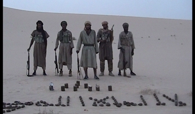 AQIM militants in the Algerian desert via wikimedia commons - Public Domain 