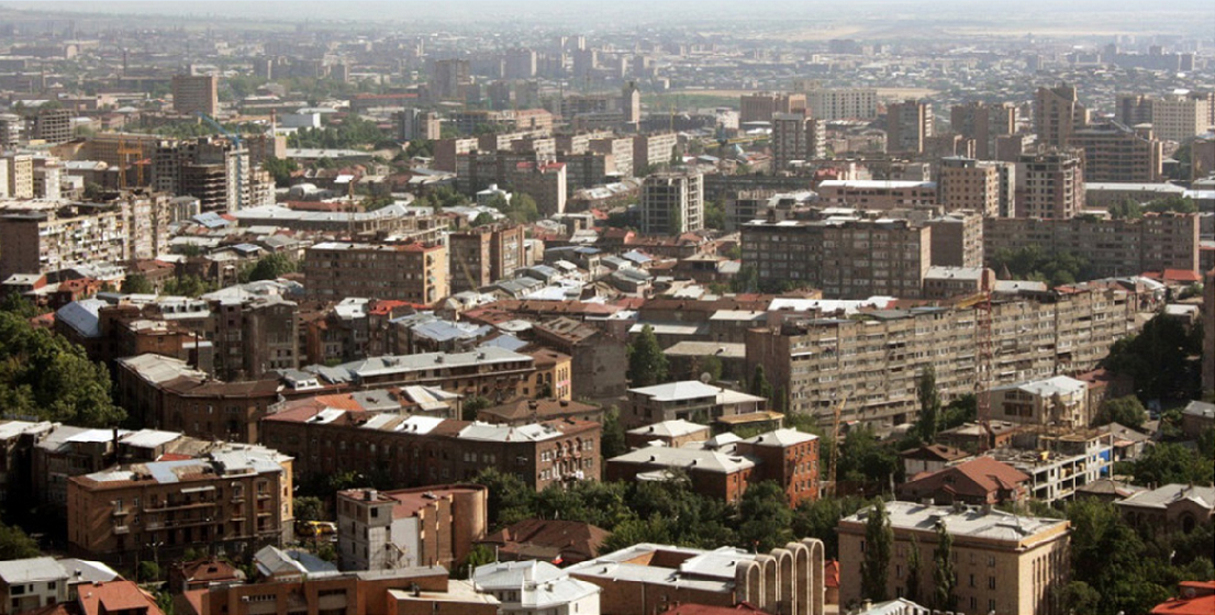 Looking south across contemporary Yerevan with a mixture of new construction sites and Soviet social housings.  Image credit: Hachikyan Alina.