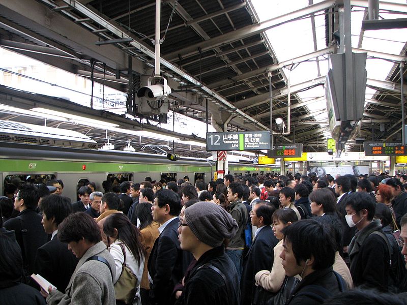 Rush hour in Shinjuku. Image by Chris73. CC BY-SA 3.0 via Wikimedia Commons