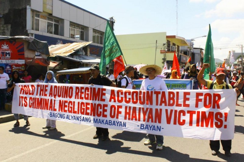 "Global Surge" protest in Tacloban City during the first year anniversary of super typhoon Haiyan. Photo Credits: Orion Yoshida.