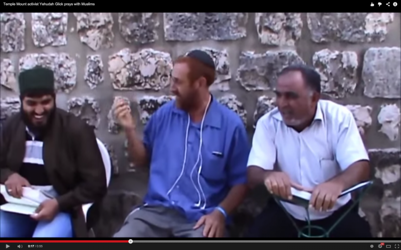 Screenshot of Rabbi Yehuda Glick praying with Muslims (video below). Sourced from YouTube. 