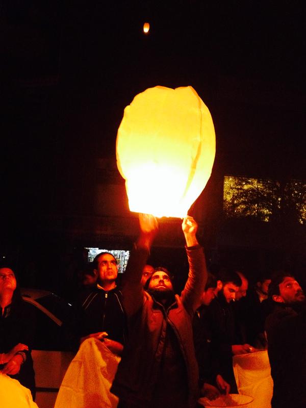 Photo tweeted from vigil in Islamabad  by @Fmullick. "In times of darkness we come together to bring light- @P_Y_A & @khudipk light lanterns for victims of #peshawarattack"