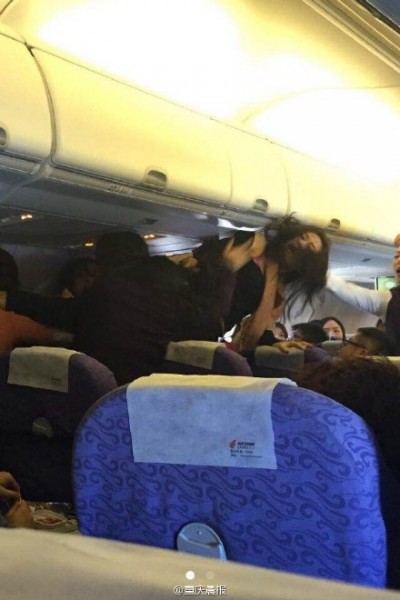 A viral photo circulated on Chinese social media on  a brawl among four women on a flight from mainland China to Hong Kong. Photo from Weibo.