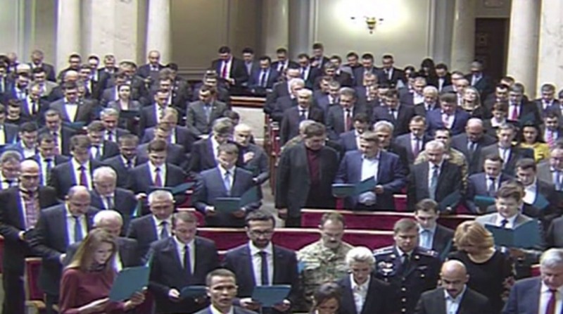 A screencapture of new Ukrainian Parliament members reading the oath