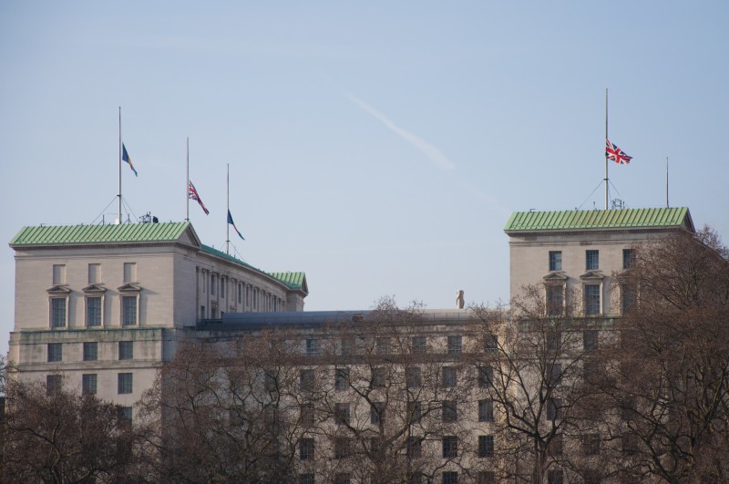 London, United Kingdom. 7th January 2015 -- Flags at half mast on the roof of the Ministry of Defence which has had close ties to Saudi Arabia -- Flags on UK Government buildings were at half mast to mourn King Abdullah, head of the controversial theocratic regime in Saudi Arabia, who died. Saudi Arabia's human rights record has been regularly criticised by campaigners. Photograph by: Andy Thornley. Copyright: Demotix